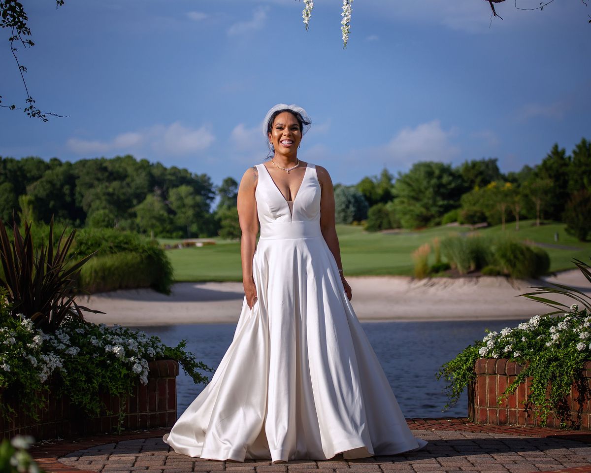 bride standing underneath the gazebo at baywood weddings
