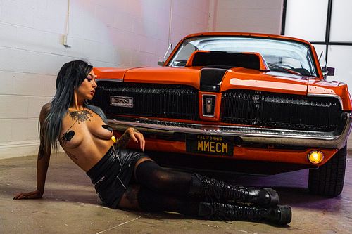 Side-profile editorial portrait of Fawn Winters topless in a Mercury Cougar — digital lifestyle photography by David Andrade, Las Vegas