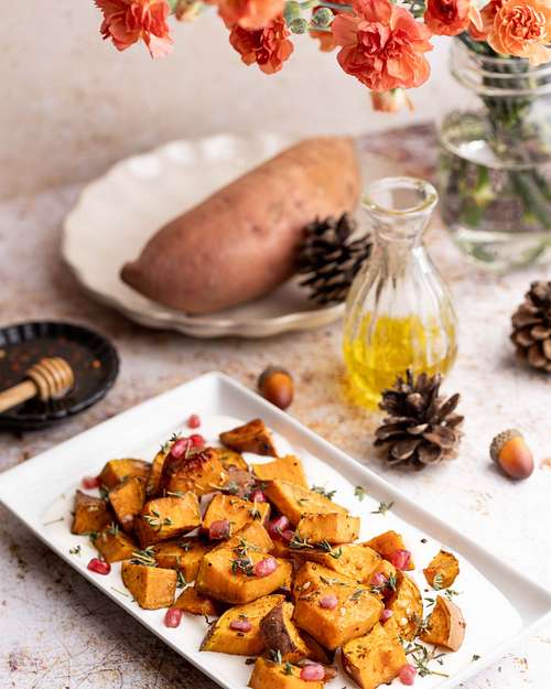Roasted potatoes plated on a rectangular platter