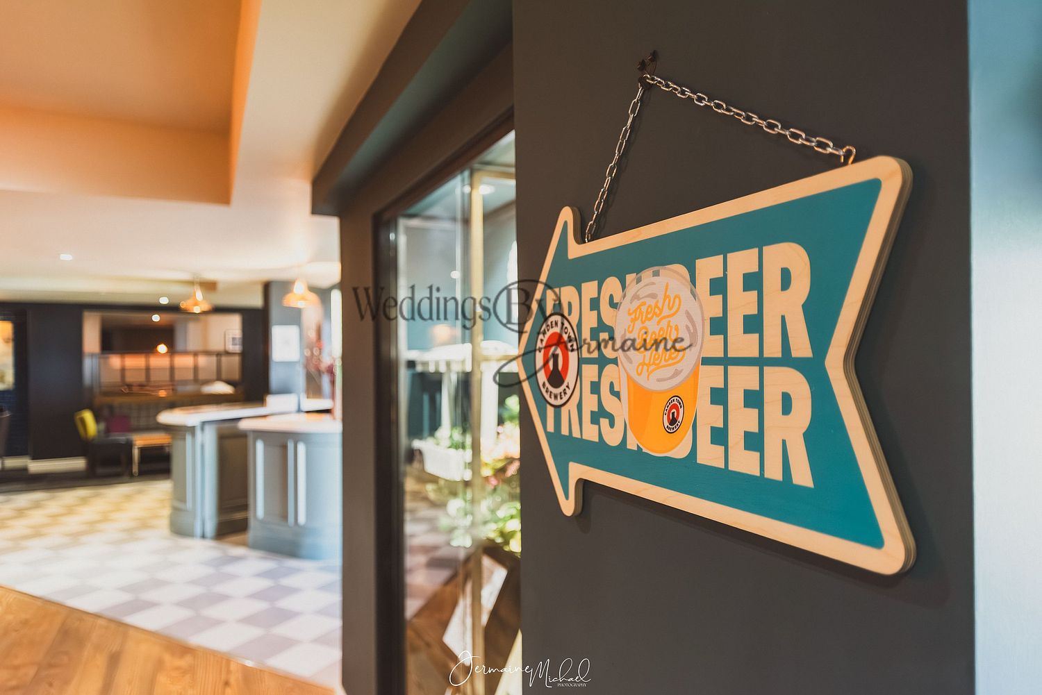 Sign directing guests to the bar at Sketchley Grange Hotel and Spa, captured by Weddings by Jermaine, showcasing the venue’s thoughtful signage and elegant design