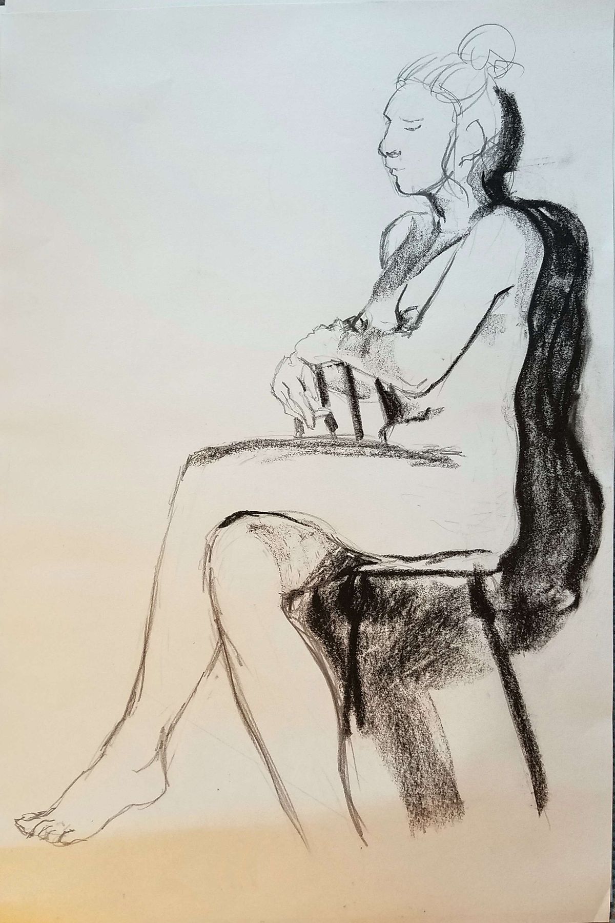 figure in chair