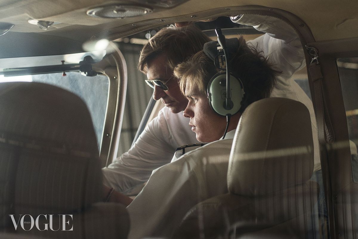 Selected for Photo Vogue Italia online portfolio. A portrait of two male pilots inside an airplane cockpit, photographed in a sepia toned style by Gabriel Matula.
