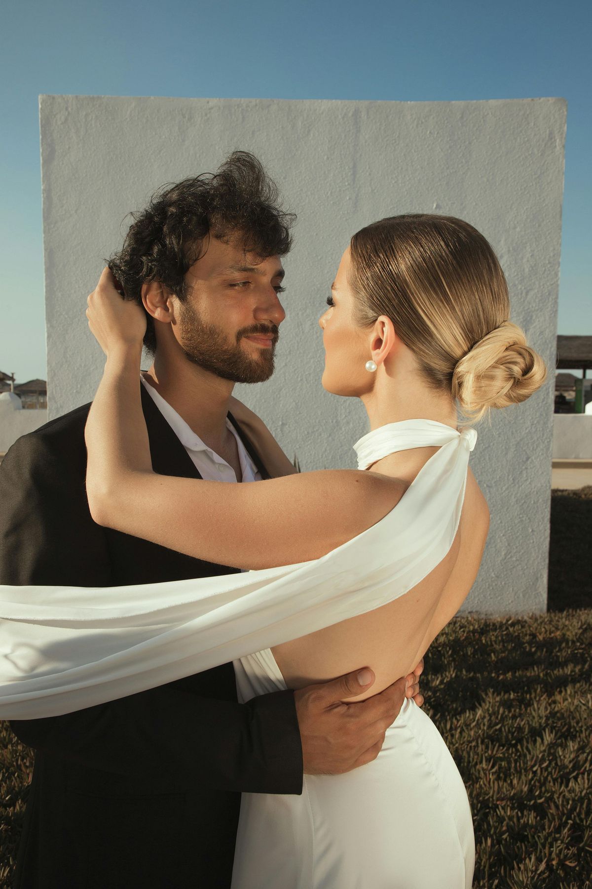 Bride and groom sharing a moment on their wedding day.