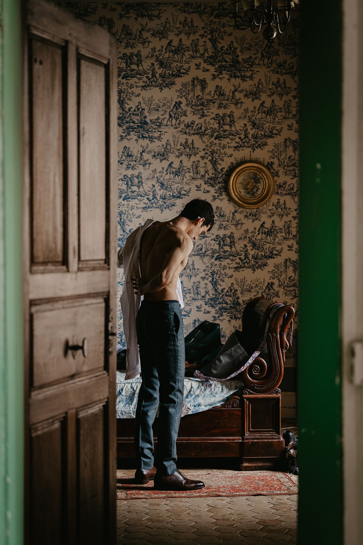 groom portrait in Beaujolais ch&acirc;teau France during spring wedding &ndash; luxury destination wedding photographer