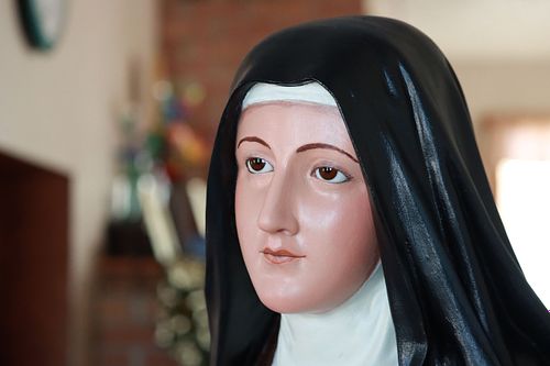 Another picture of Saint Therese statue restored