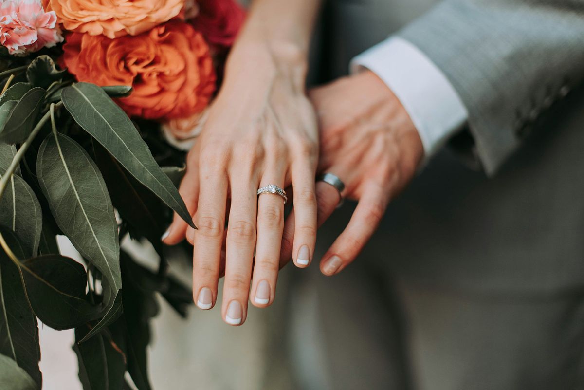 Bride and groom sharing a moment on their wedding day.