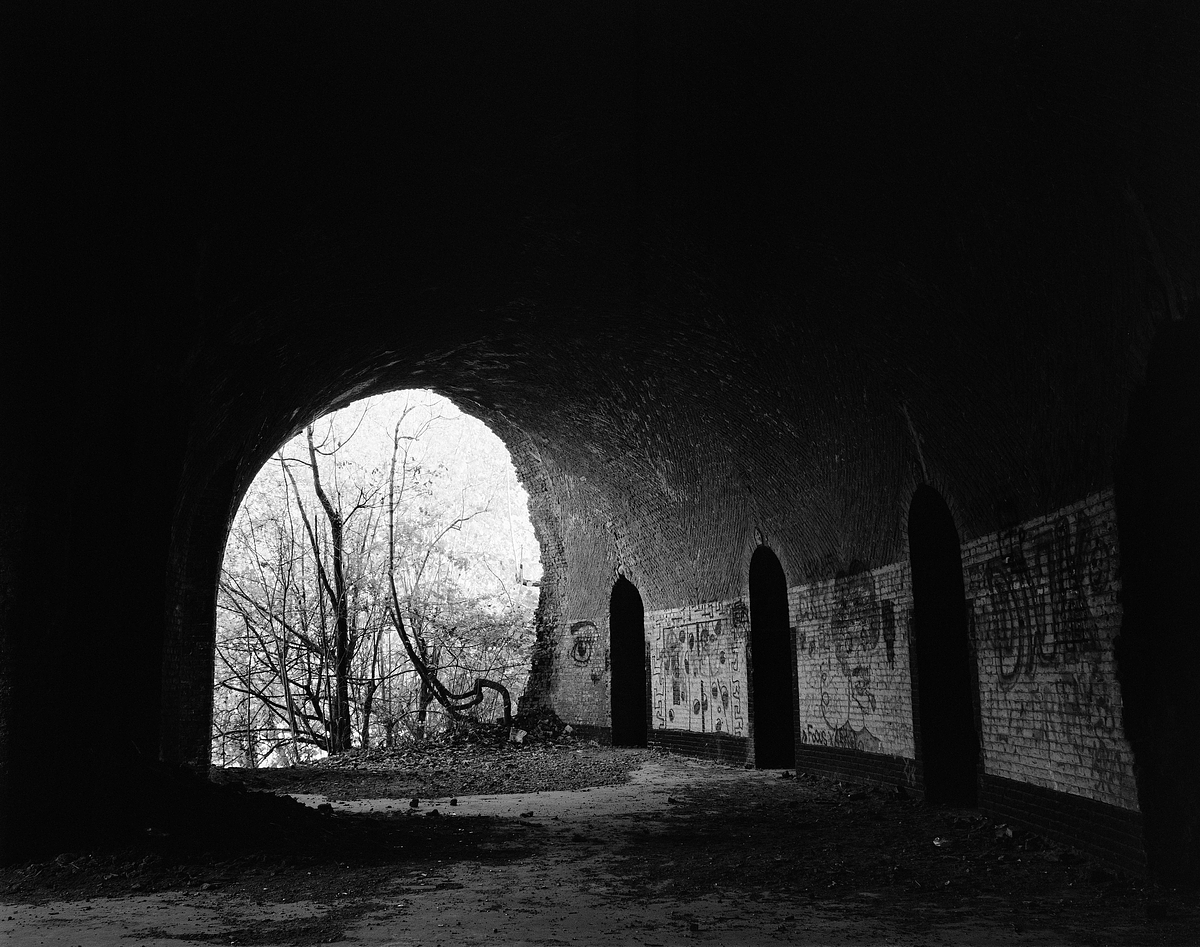 Partially destroyed living quarters of Fort III