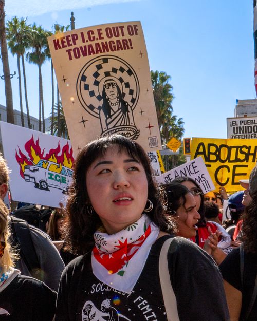 asian woman at Los Angeles immigrants rights demonstration