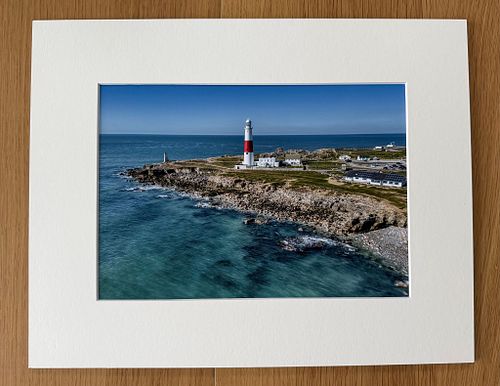 Example of a 10x7 Print on 14x11 mount.