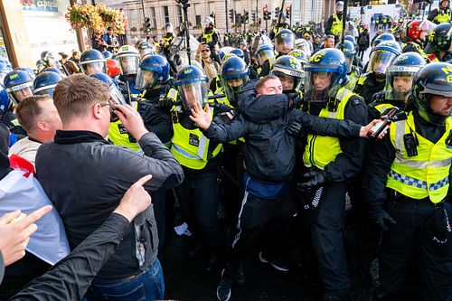 Violent clashes at “Unite the Kingdom” march, London, UK