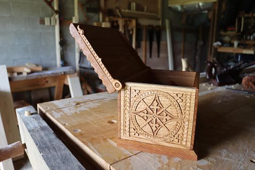 showing the gothic carved box with the lid open from the other side