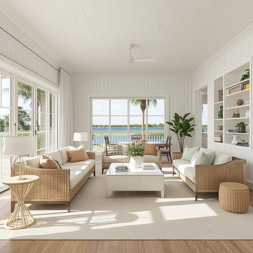 Professional real estate photography of a sun-filled, modern living room featuring white sofas, built-in shelving, and a scenic water view in Gainesville FL by PrimePropertyPhoto.