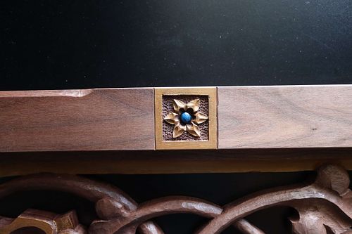 hand-carved and polychrome painted small star of bethlehem flower