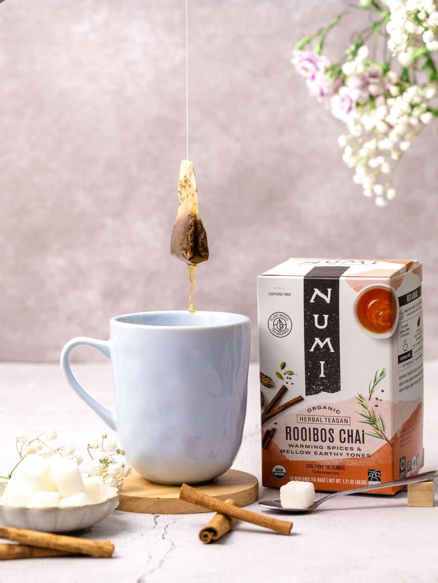 Tea bag dripping into a mug