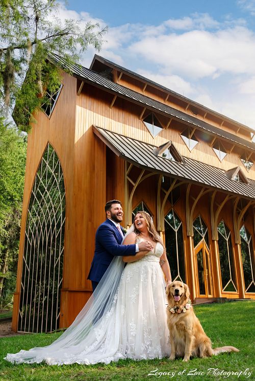 Mature bride and groom laughing with their golden retriever during a second marriage ceremony at the Baughman Center in Gainesville.