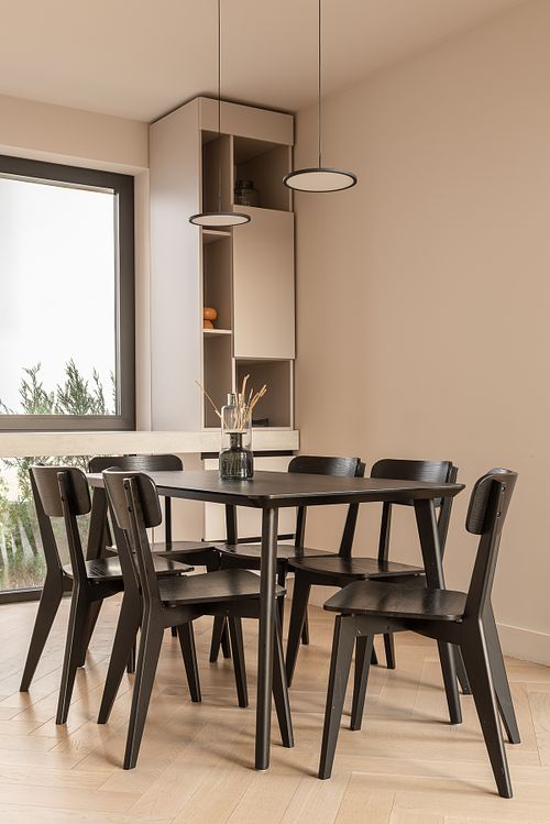 Minimalist dining area highlighting refined design elements – Faget project
