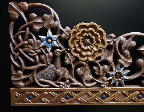 wood carving of a stylized turtle dove, flowers, and vines for the tabernacle at St. Bernadette Catholic Church