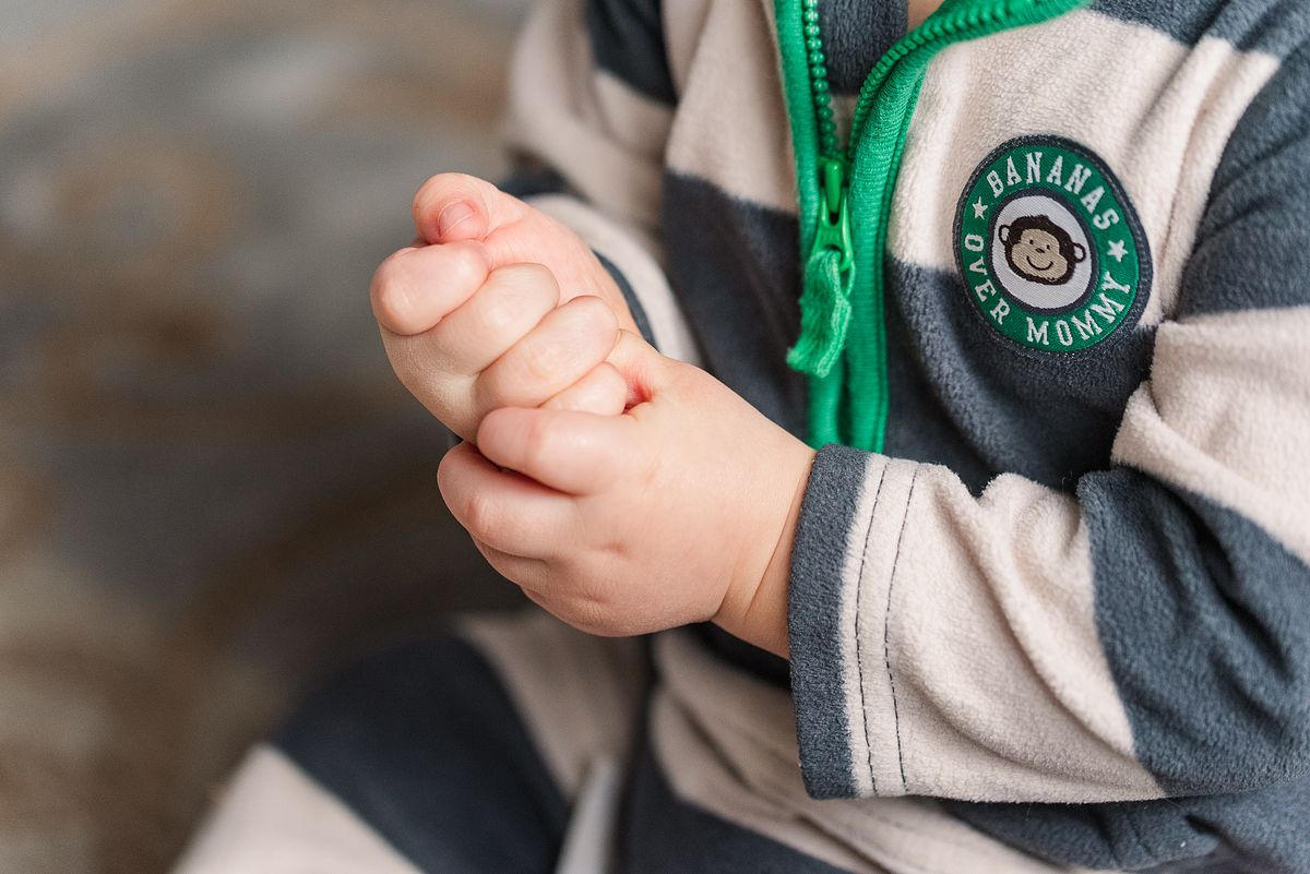 baby sitting and holding his hands tightly, in Cranberry Township, PA