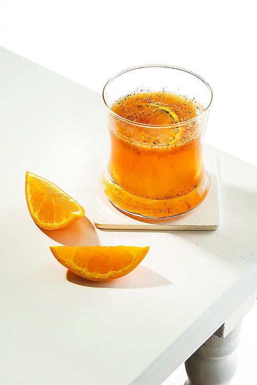 Food Styling Photos : Orange drink with a slice of a orange