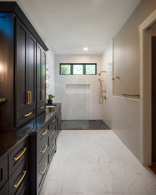 View of Shower, flush and heated shower floor, seamless glass partition wall, no door