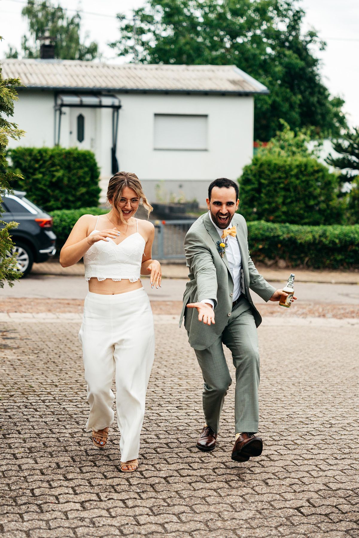 wedding couple entering the party