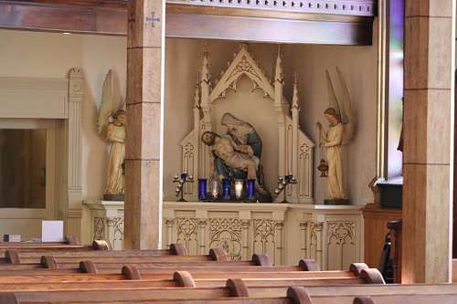 custom, hand-carved and painted shrine for the Sorrowful Mother in the gothic style at Holy Family Catholic Church