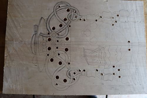 basswood panel full of holes ready for cutting out