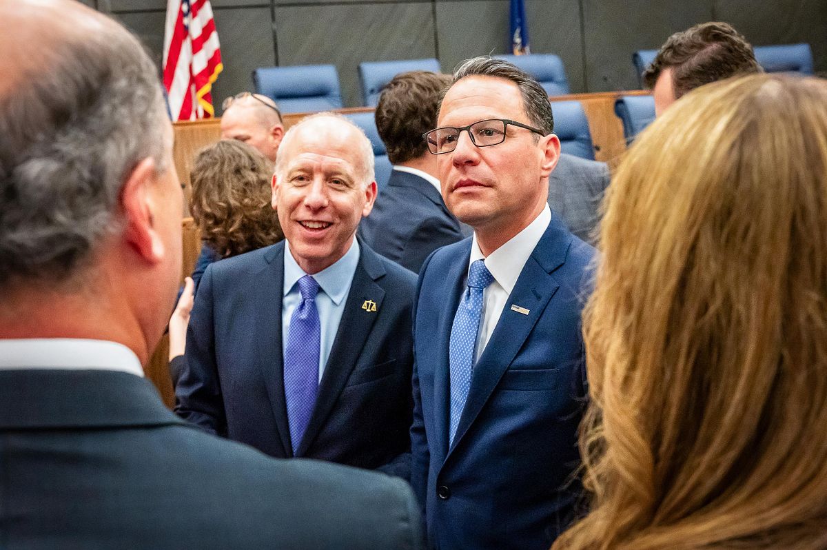 Corporate event photography capturing Governor Josh Shapiro speaking with attendees after Judge Gail Weilheimer&rsquo;s 2025 investiture in Philadelphia, highlighting leadership, authenticity, and connection.