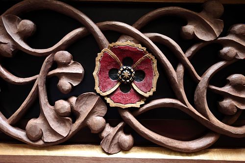 the finished Poppy flower with beautiful red, black and gold paint