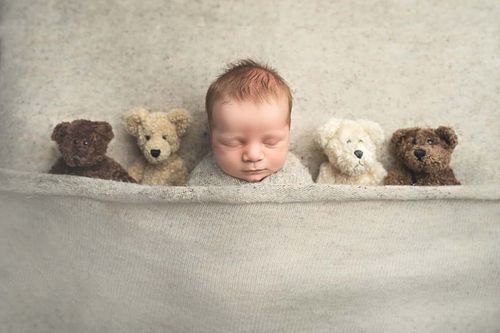 Newborn boy with teddy bear prop – newborn photo session Houston