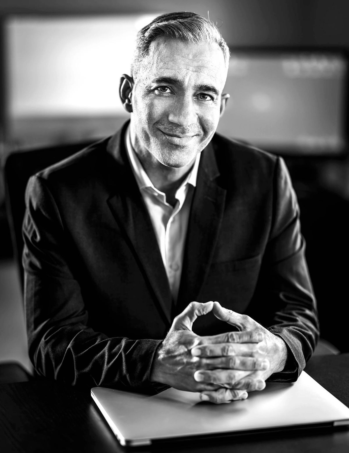 Portrait of a business man at his desk.