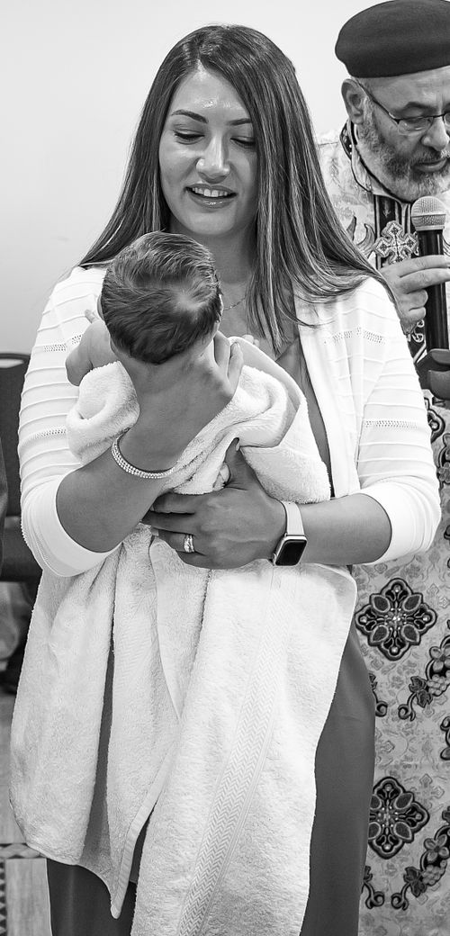 baby baptism ceremony at Ottawa church captured by Kameel Photography