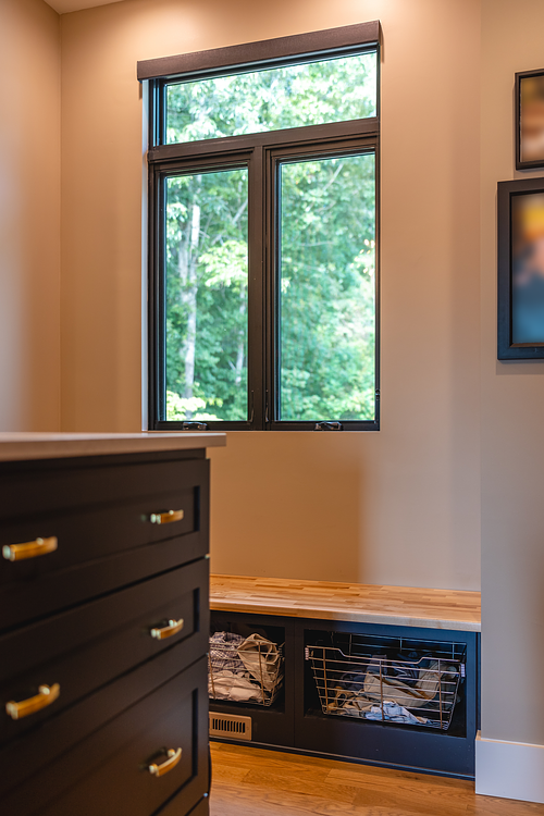 View of butcherblock bench in dressing room