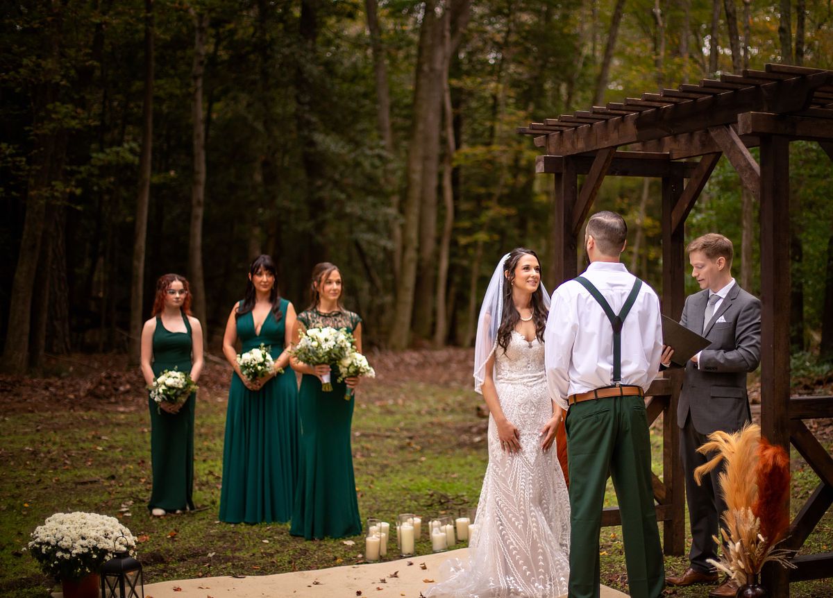 bride and groom during ceremony on the eastern shore forest wedding