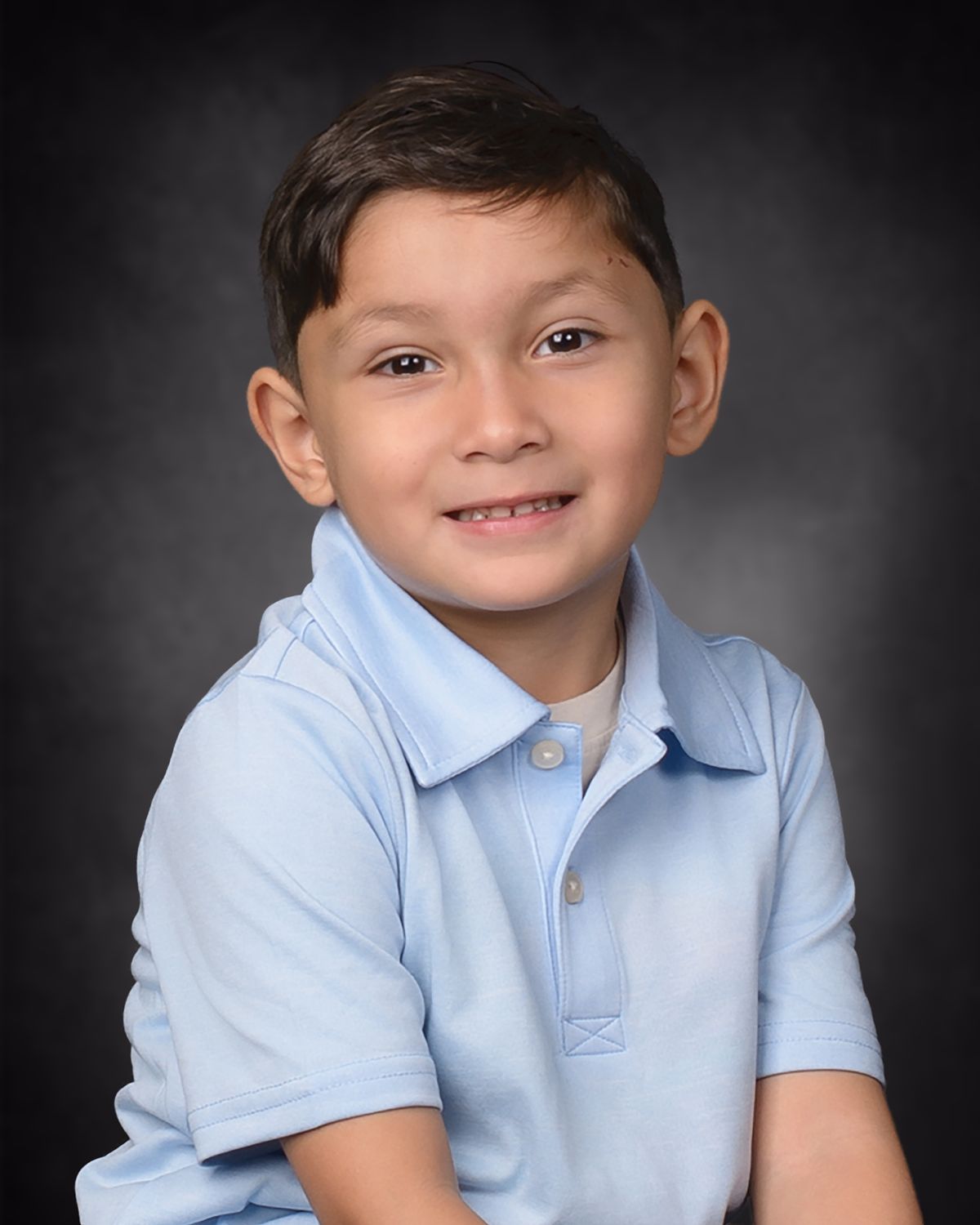 Class photo of a Pre-K boy taken during school picture day.