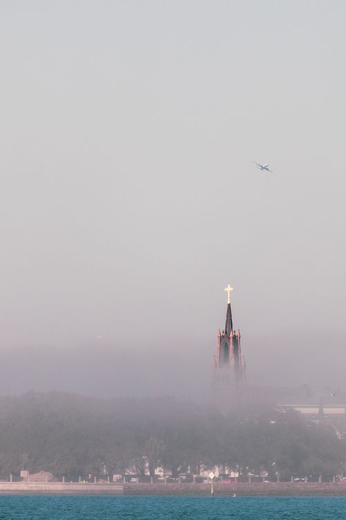 Spire of St  Phillips Church in Charleston in Morning Fog with A
