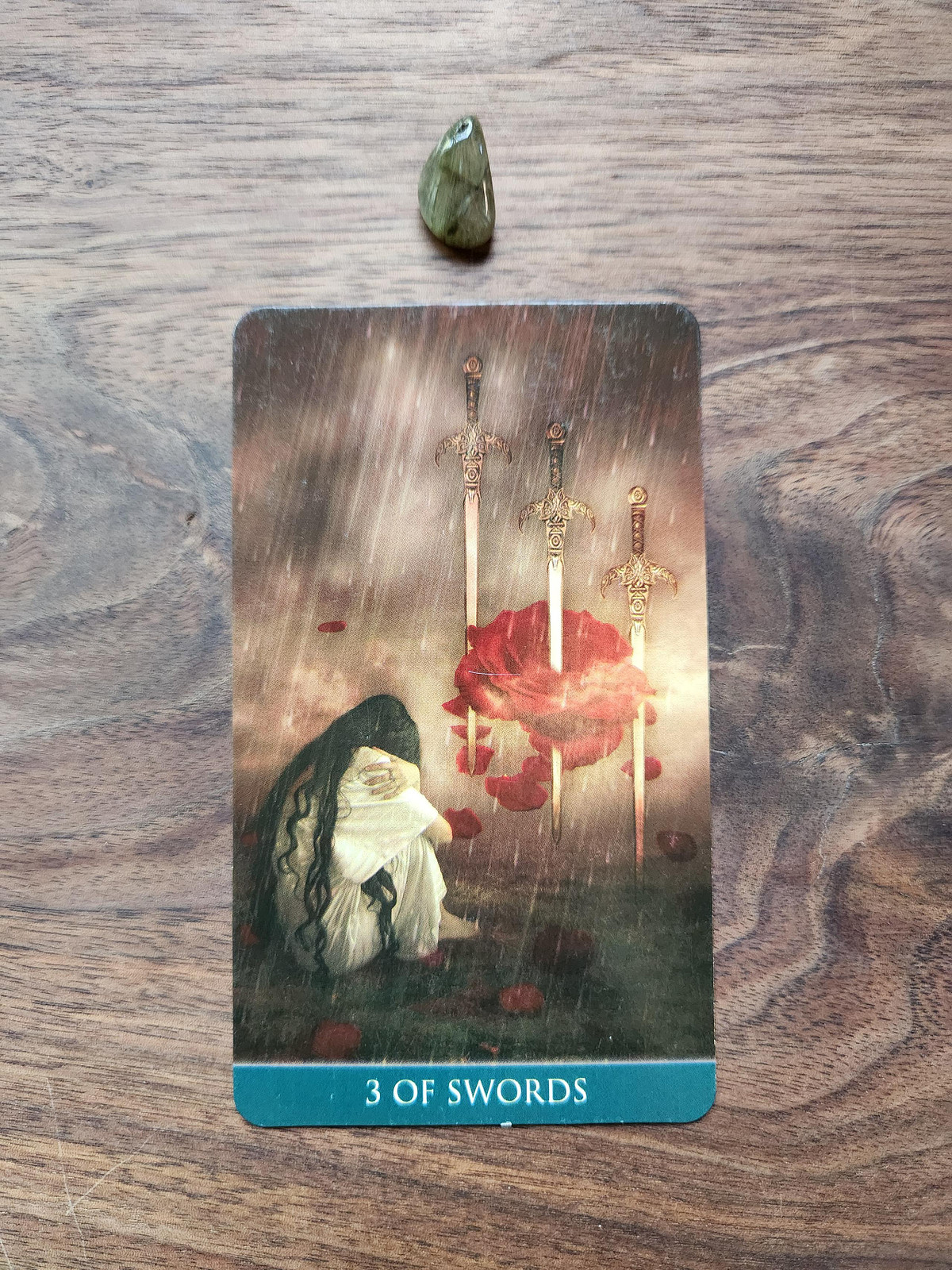 Rutilated Quartz and the Three of Swords Card