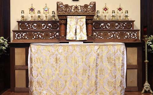 high altar at St. Bernadette Catholic Church with gradines in context and use by Wes and Kelly Baker