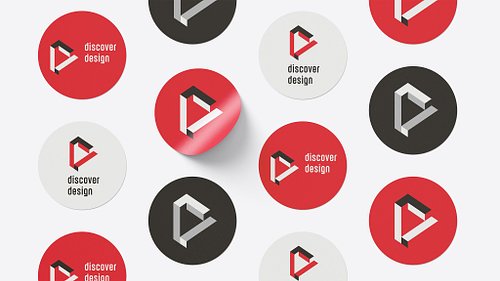 Mockup of various Discover Design stickers in red, black, and white, each featuring different logo variations.