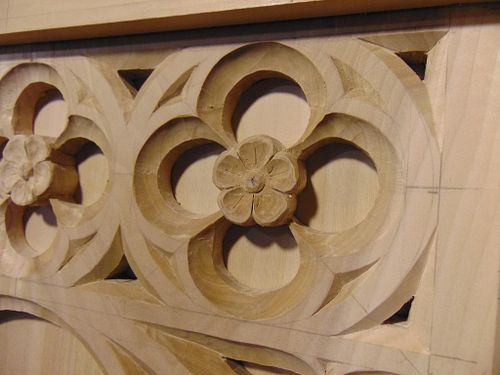 rose quatrefoil wood carving