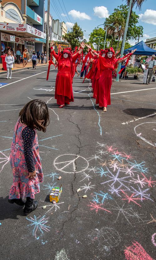 Red Rebellion move down Lismore Street.