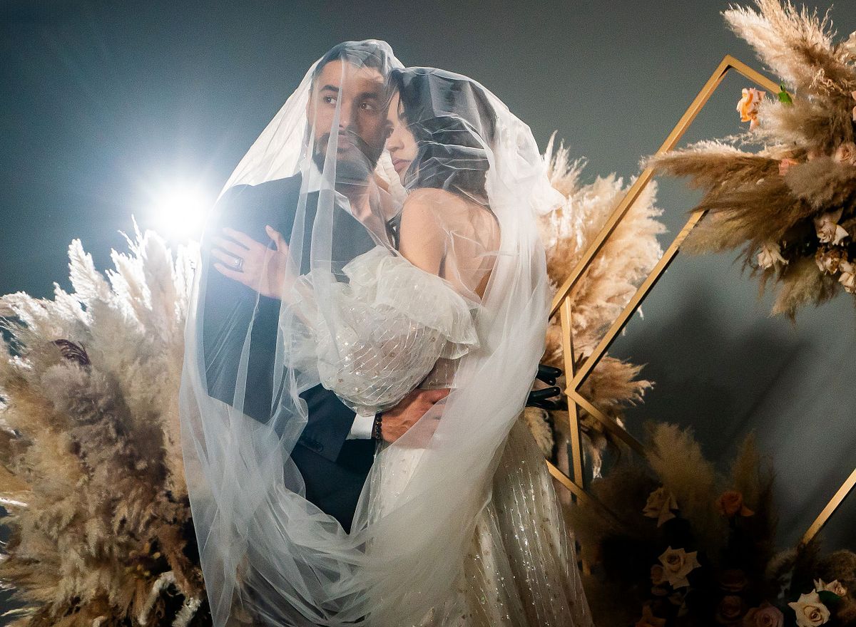 Bride and groom sharing a moment on their wedding day.