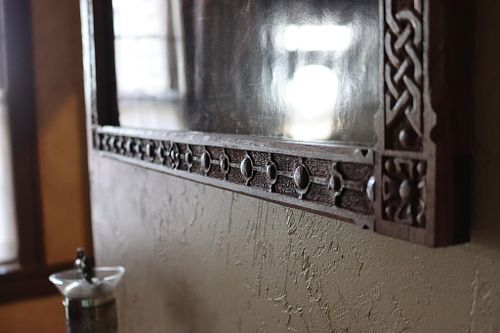 detail of the bead carvings on the Celtic Revival picture frame