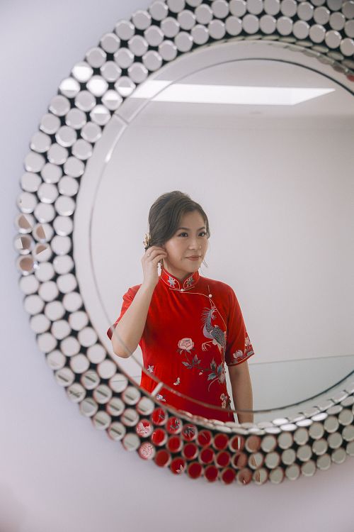 Chinese bride getting ready for traditional tea ceremony