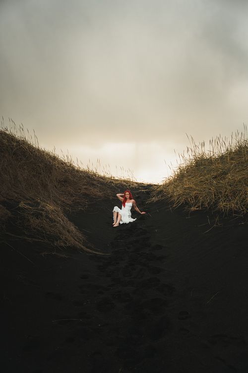 Minimalist white dress photoshoot in remote Iceland