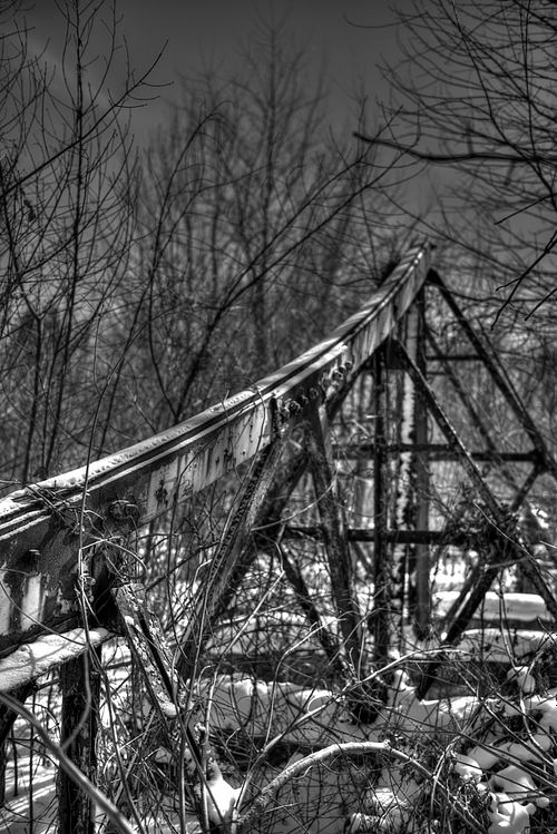 7 foot photographer, workshop tour in US, United States, black & white, b&w, abandoned roller coaster at amusement park