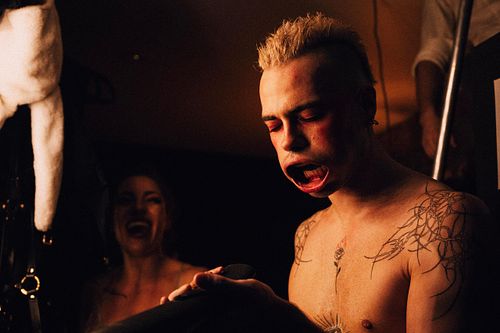 Circus artist Ben Loader playing with air behind the scenes after the show has finished